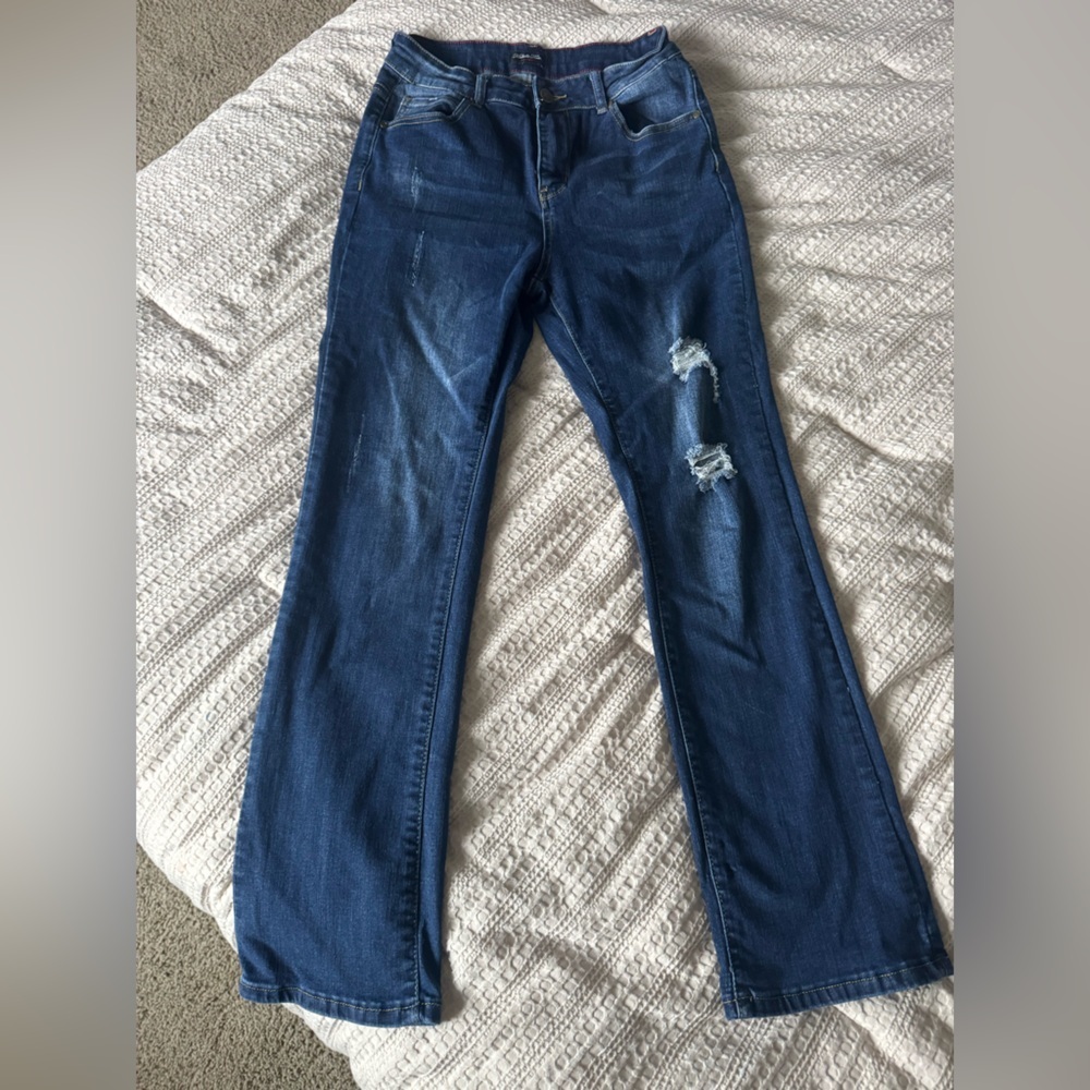 Women's Distressed Blue Jeans